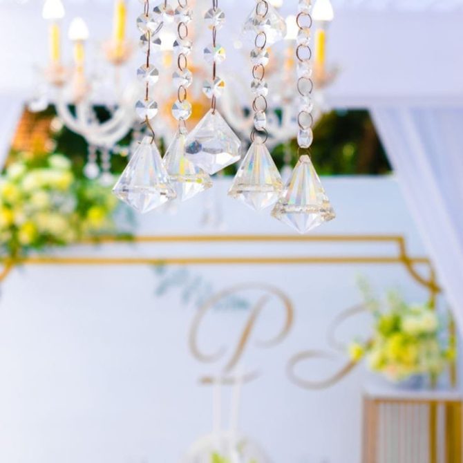 a chandelier with crystal prisms from the ceiling | Leading Event Planners In Kenya